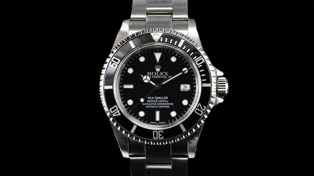 rolex sea dweller black background
