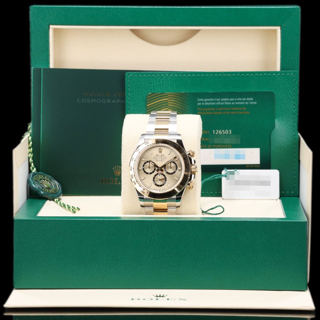 Rolex Daytona Cosmograph Stainless Steel / Yellow Gold / Champagne