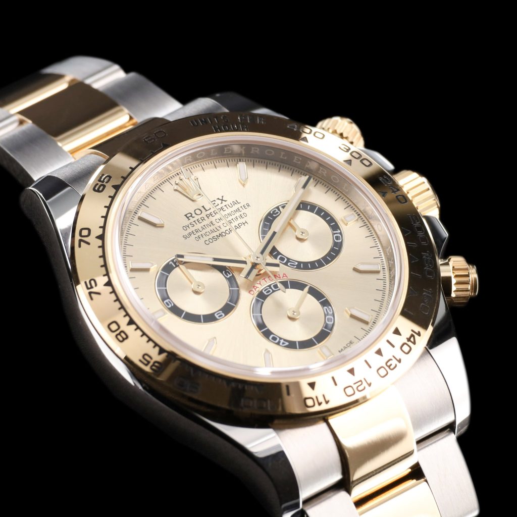 Rolex Daytona Cosmograph Stainless Steel / Yellow Gold / Champagne