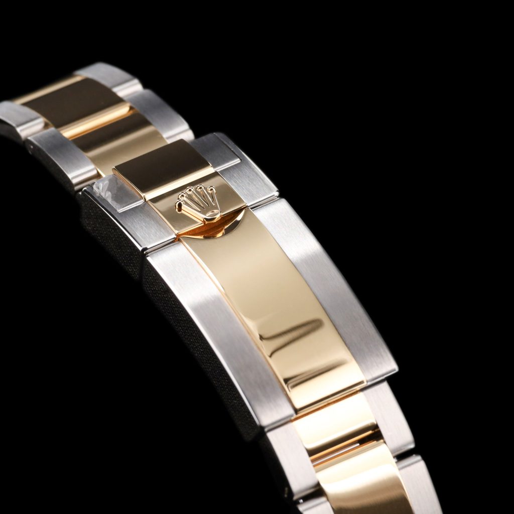 Rolex Daytona Cosmograph Stainless Steel / Yellow Gold / Champagne