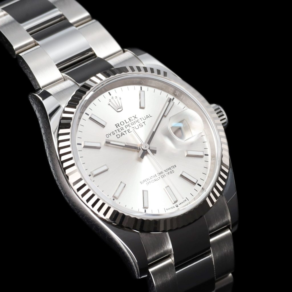 Rolex Datejust Stainless Steel / Fluted / Silver Roman-Diamonds / Oyster