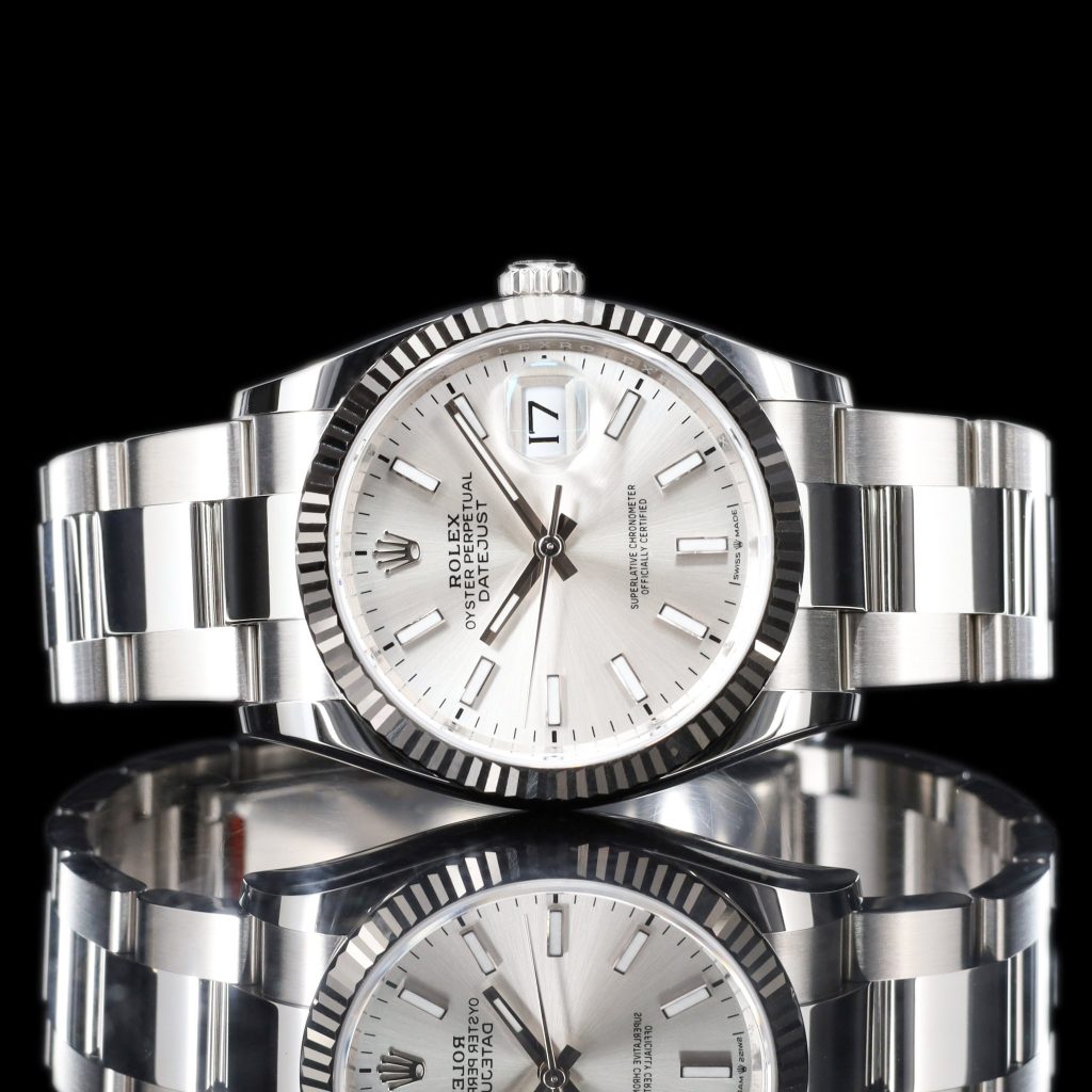 Rolex Datejust Stainless Steel / Fluted / Silver Roman-Diamonds / Oyster