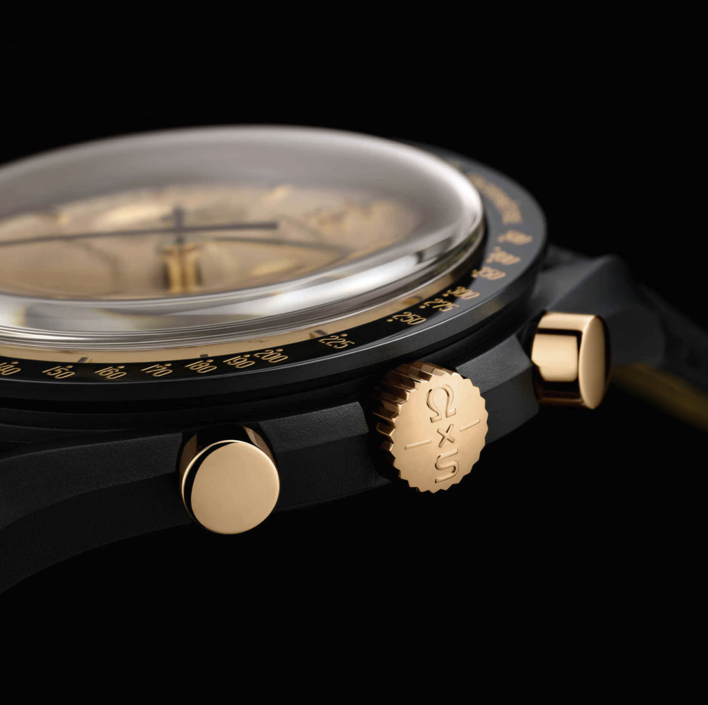 Swatch Mission to the Moon 1969 side profile with gold crown and pushers
