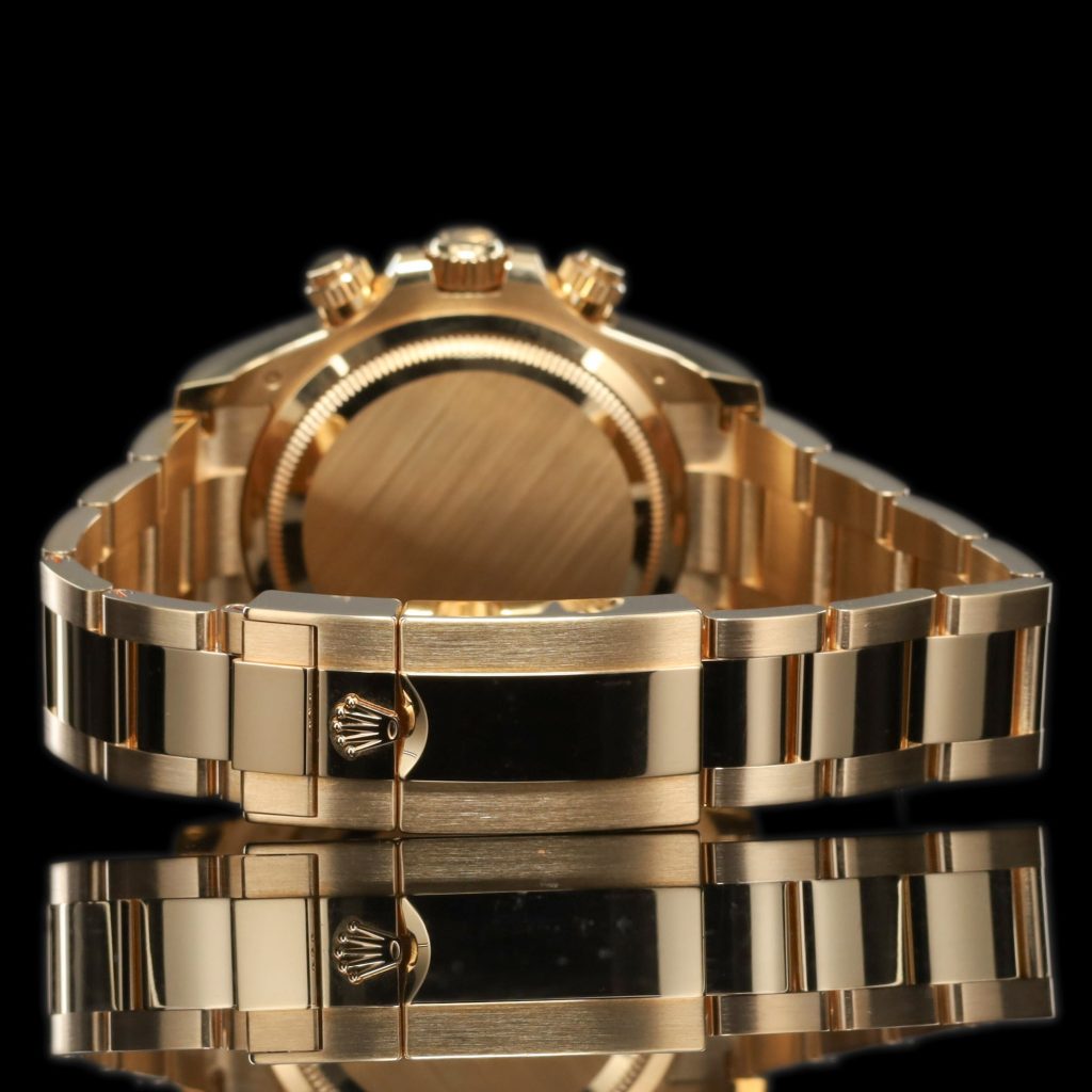 Rolex Daytona Cosmograph Yellow Gold / Black – Champagne / Oyster